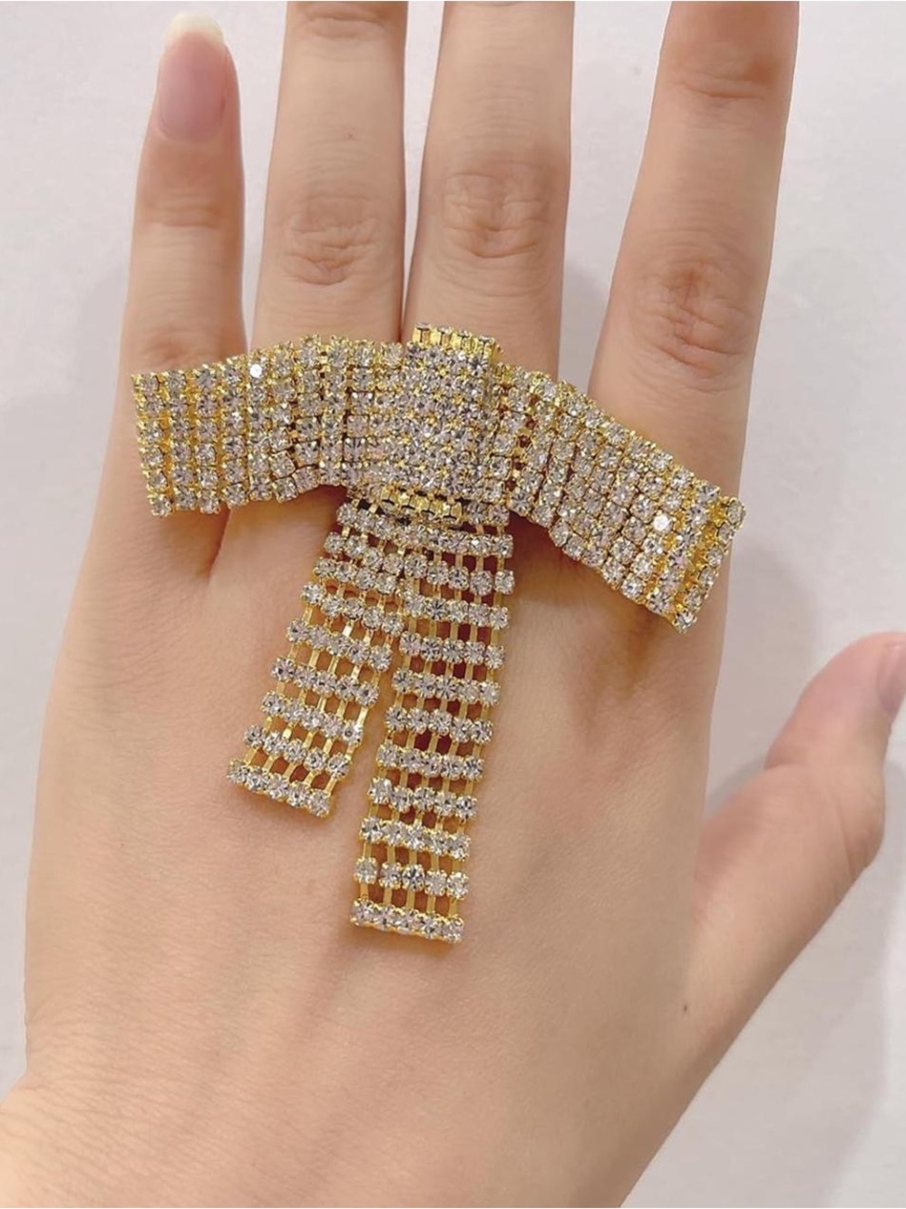 Anthropologie Gold and Clear Crystal Bow Ring